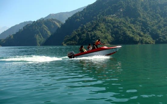 Boating in the turquoise waters of Chamera Lake